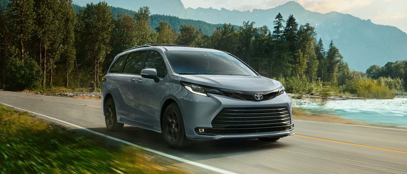 2026 Toyota Sienna Exterior Driving Near Mountain Lake