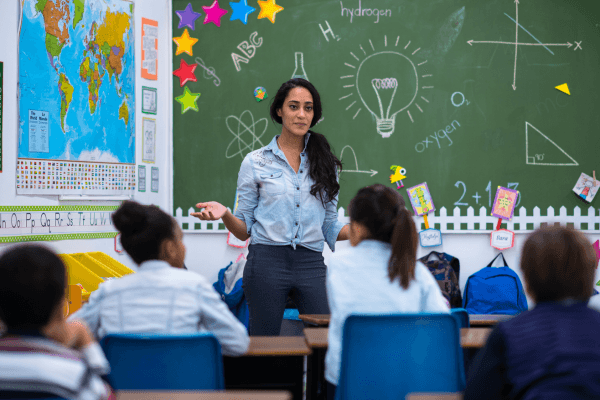 Teacher talking to students