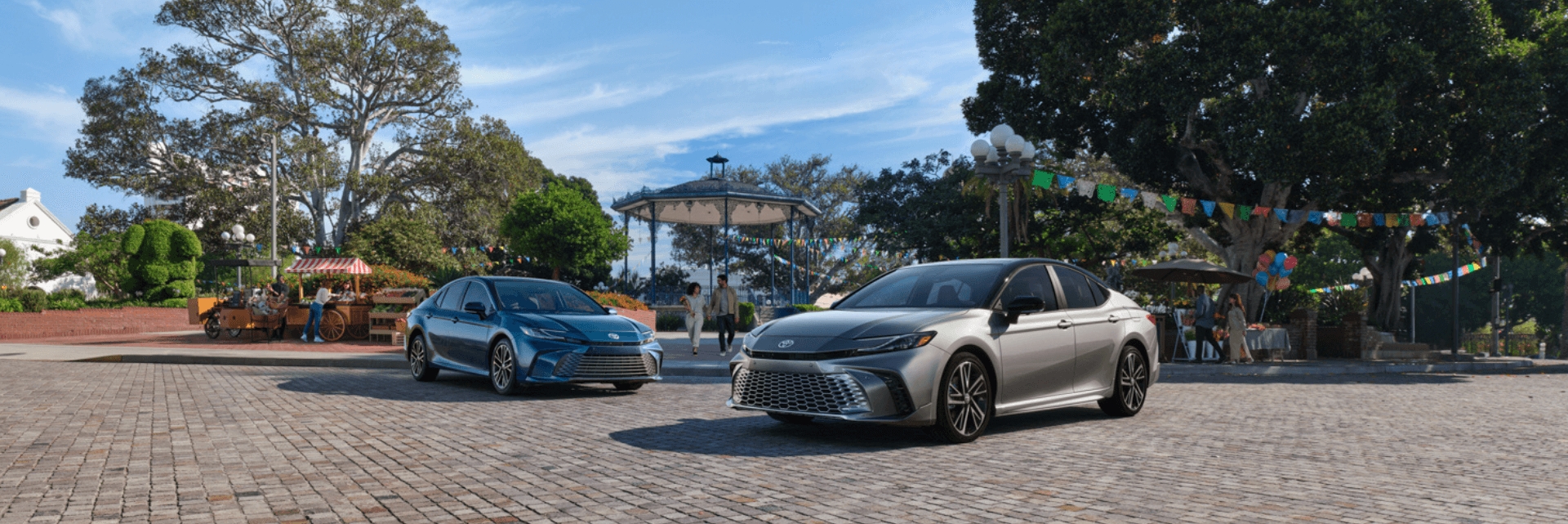 Toyota Camrys parked at a farmers market