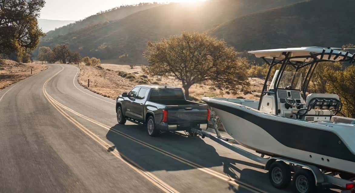 2026 Toyota Tundra towing a trailer on Indiana roads — Toyota of Warsaw