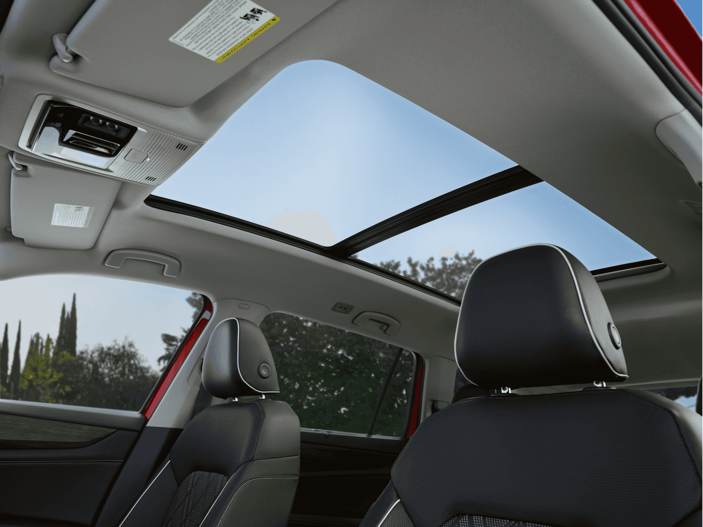 Volkswagen Atlas interior view with panoramic sunroof and premium seating