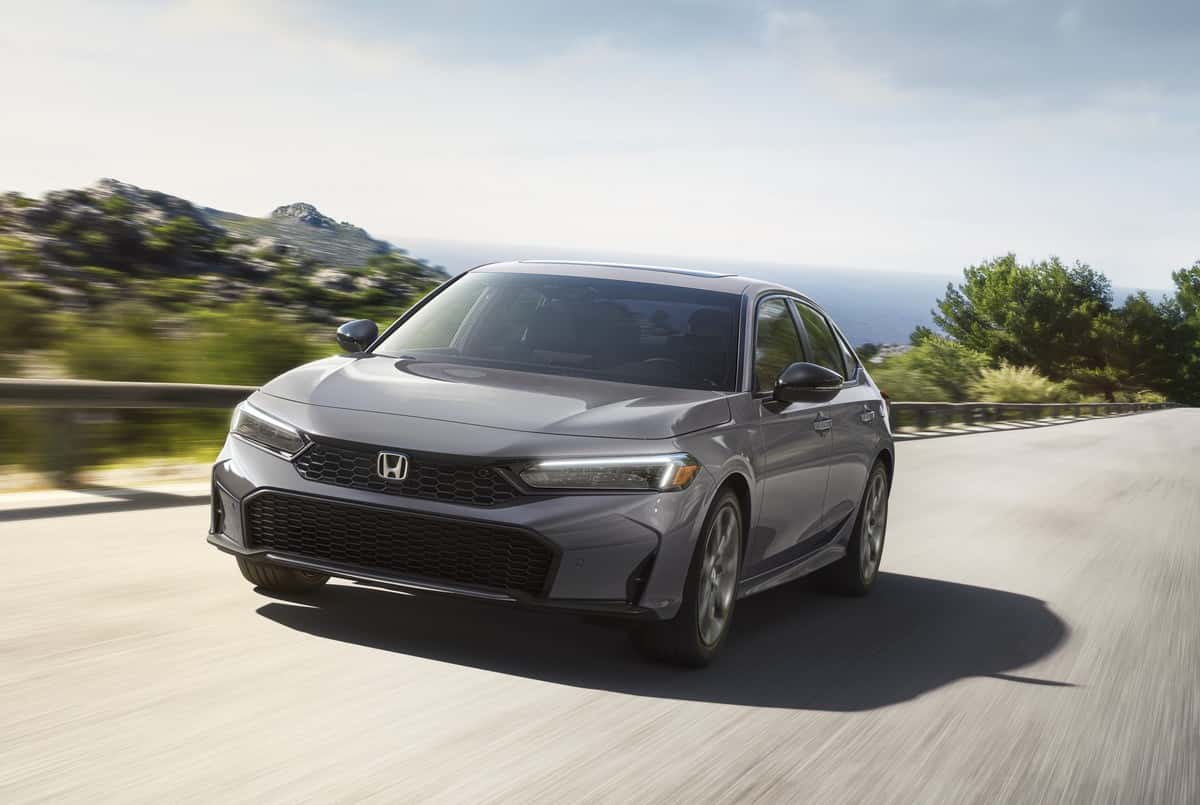 2026 Honda Civic Hybrid sedan on the road