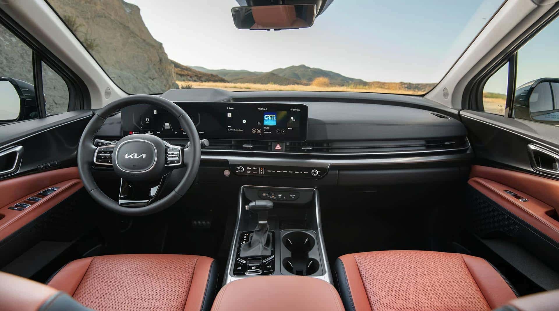 2026 Kia Carnival interior with panoramic display.