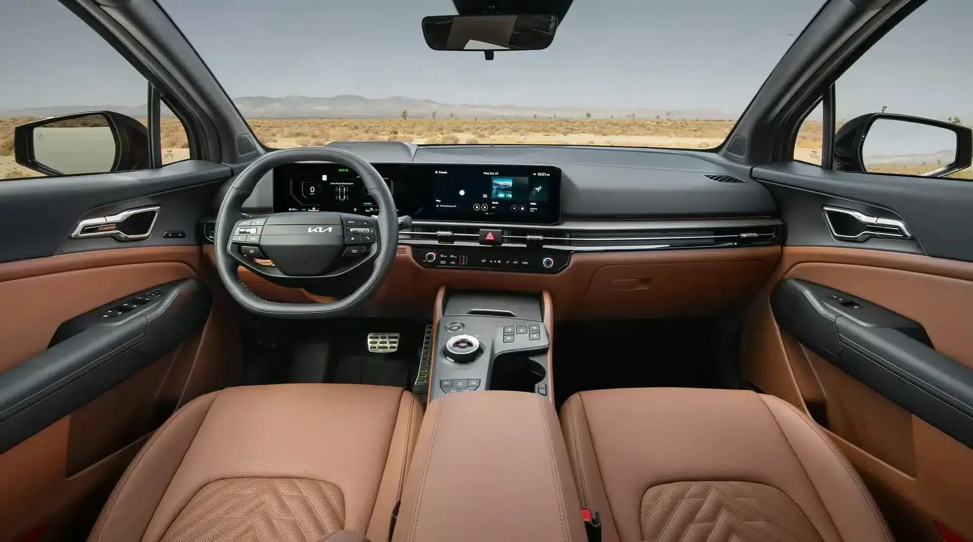 2026 Kia Sportage Hybrid interior with panoramic display.