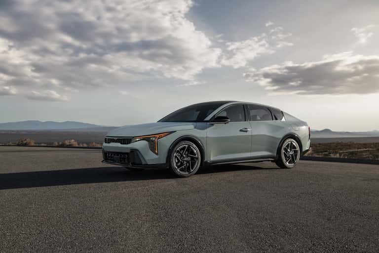 Front three-quarter view of the 2026 Kia K4 sedan. (Representative image for illustration purposes only. Actual vehicle may vary based on trim and configuration.)