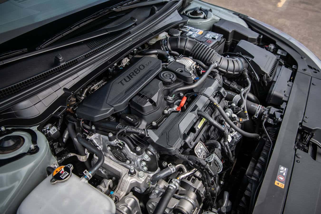 2026 Kia K4 engine. (Representative image for illustration purposes only. Actual vehicle may vary based on trim and configuration.)