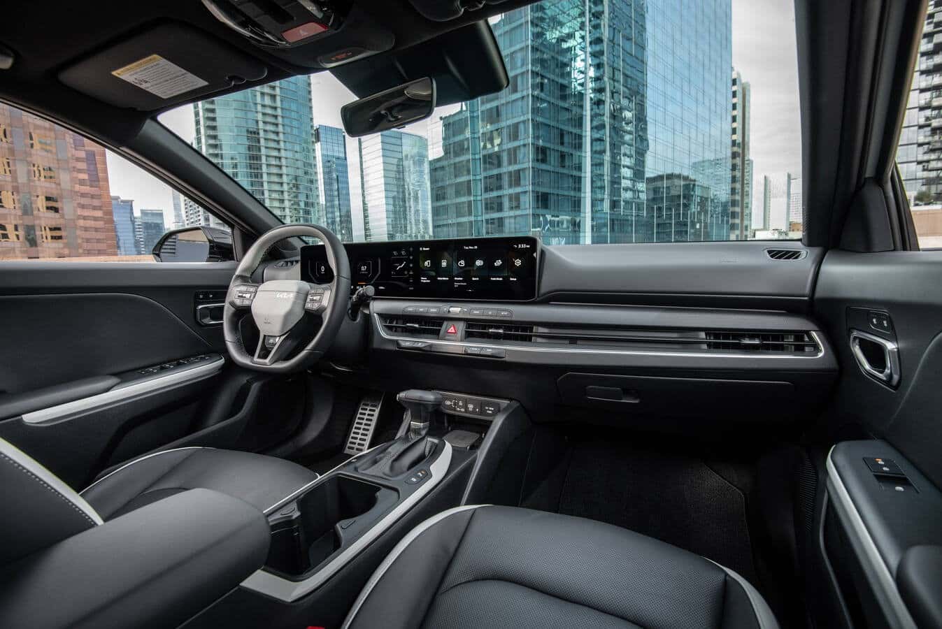 Interior of the 2026 Kia K4 showing cabin space and legroom. (Representative image for illustration purposes only. Actual vehicle may vary based on trim and configuration.)