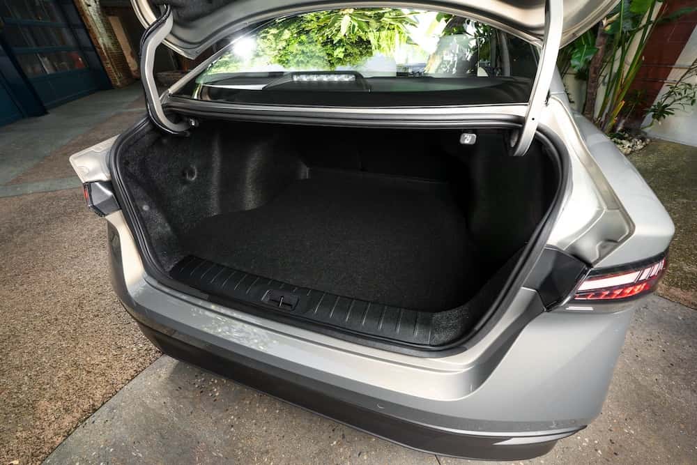 Open trunk of a 2027 Nissan Sentra SL showing 14.3 cubic feet of cargo space