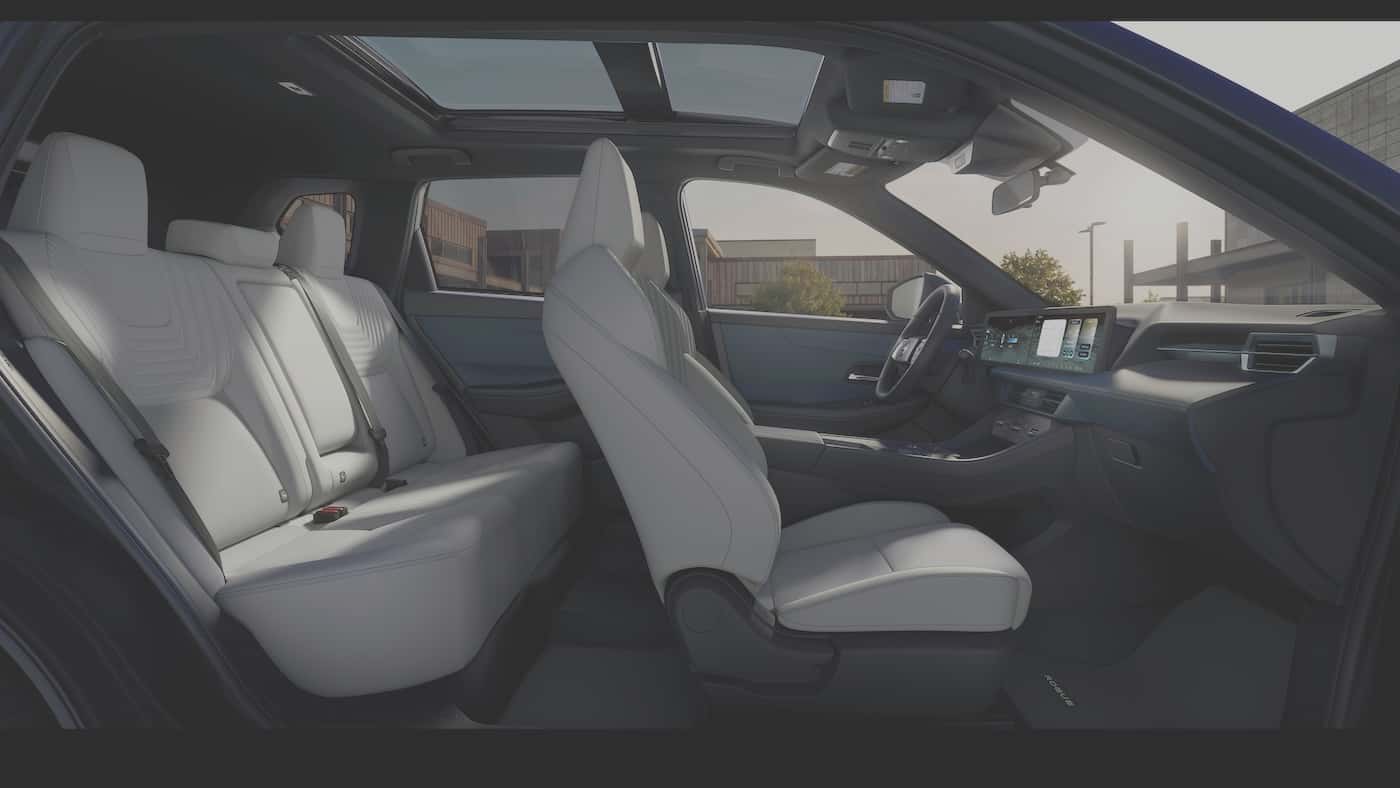 2027 Nissan Rogue Hybrid cabin with light gray Zero Gravity front and rear seats and a panoramic moonroof