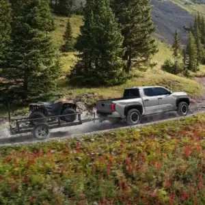 2025 Toyota Tacoma Towing an ATV on a Trailer