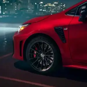 2026 Toyota GR Corolla Supersonic Red headlights on