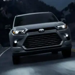 2026 Toyota Grand Highlander Cement driving at night