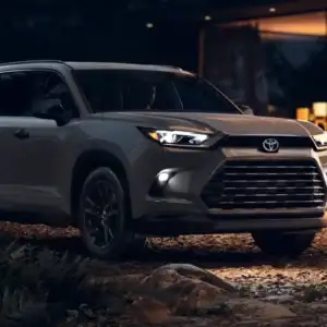 2026 Toyota Grand Highlander Cement parked at night