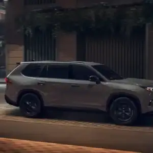 2026 Toyota Grand Highlander Cement parked at night