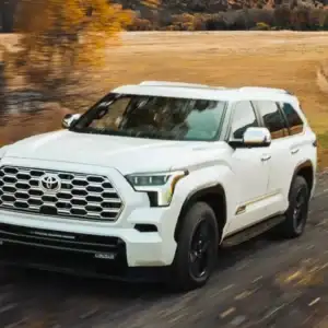 2026 Toyota Sequoia white driving on a dirt road