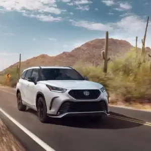 2026 Toyota Highlander Hybrid Driving in the Desert