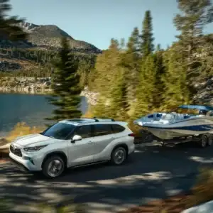 2026 Toyota Highlander Hybrid Towing a Boat