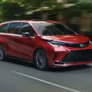 2026 Toyota Sienna XSE Ruby Flare Pearl in motion