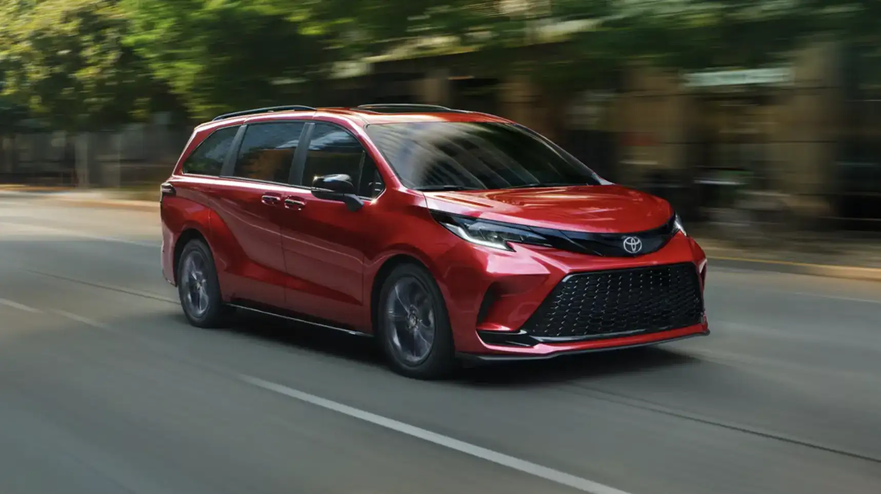 2026 Toyota Sienna XSE Ruby Flare Pearl in motion