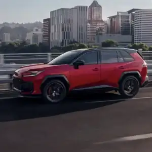 2026 Toyota RAV4 PHEV GR Sport Supersonic Red in a city