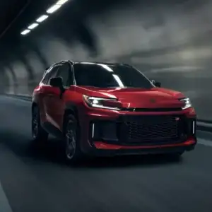 2026 Toyota RAV4 PHEV Supersonic Red in a tunnel