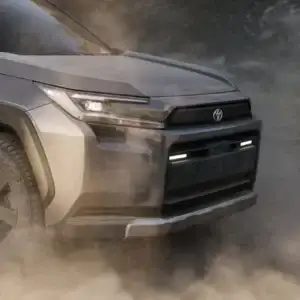 2026 Toyota RAV4 PHEV Woodland Urban Rock dusty road