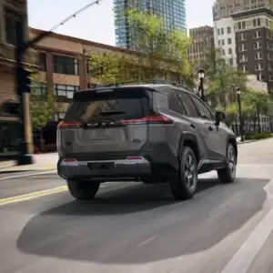 2026 Toyota RAV4 PHEV Woodland Urban Rock in a city