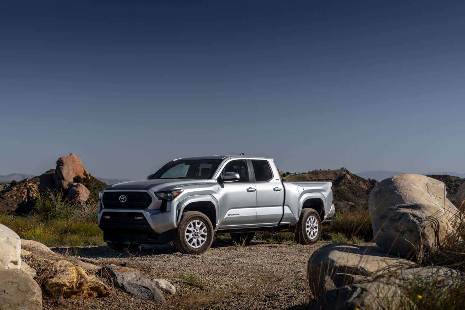 2026 Toyota Tacoma on a desert trail. (Representative image for illustration purposes only. Actual vehicle may vary based on trim and configuration.)