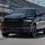 A black RAM 1500 on a race track
