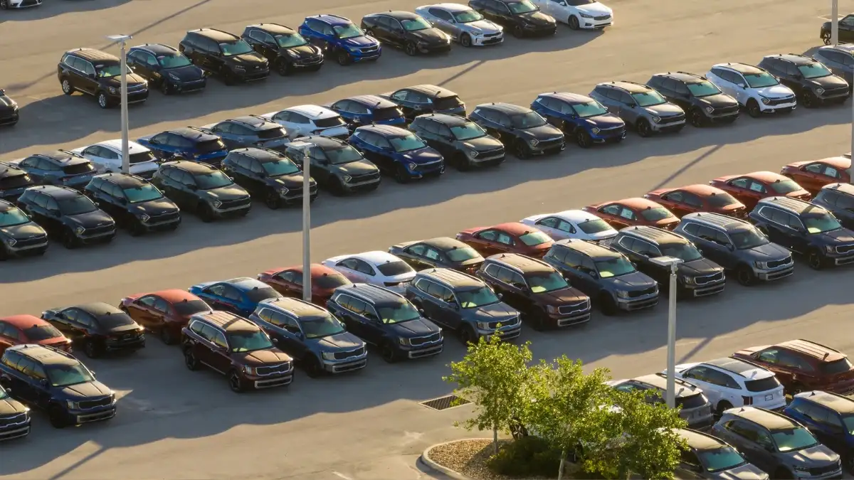 An overheard view of a dealership parking lot