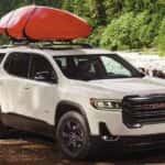 White 2022 GMC Acadia parked off-road
