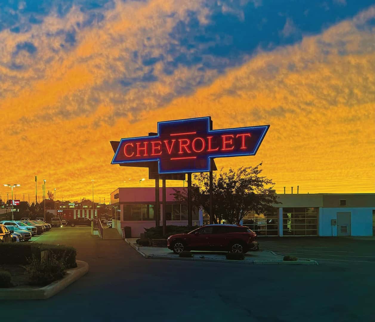 Dealership sign and building