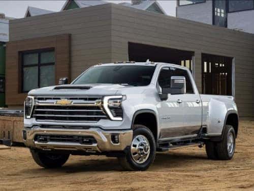 2024 Chevrolet Silverado HD exterior view parked outside a house under construction