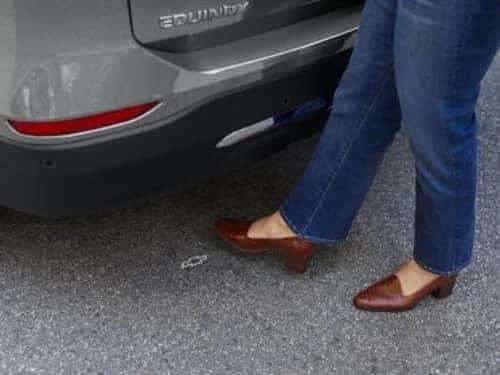 2024 Chevrolet Equinox close up view of usage of handsfree liftgate
