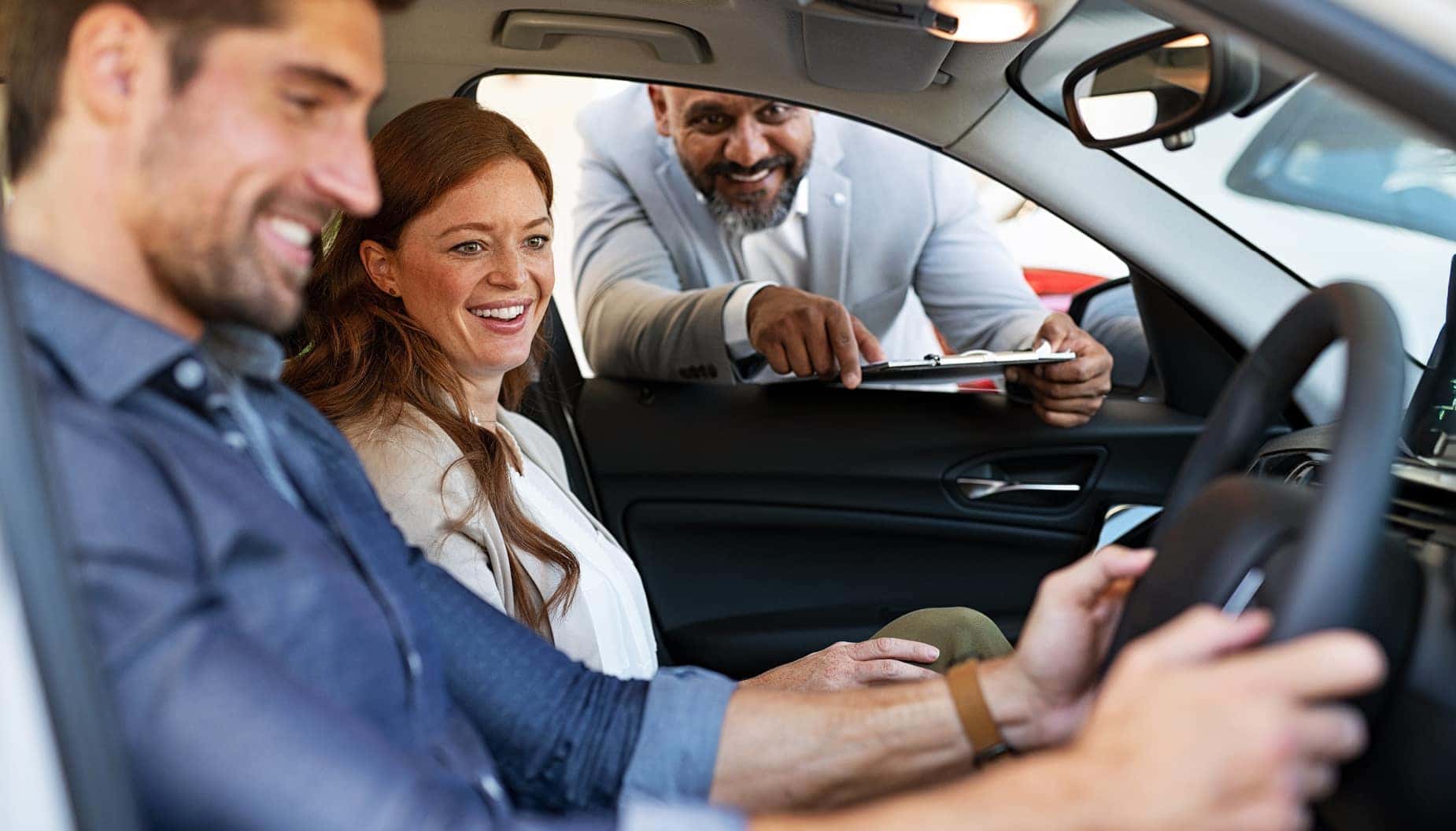 Man sitting behind steering wheel