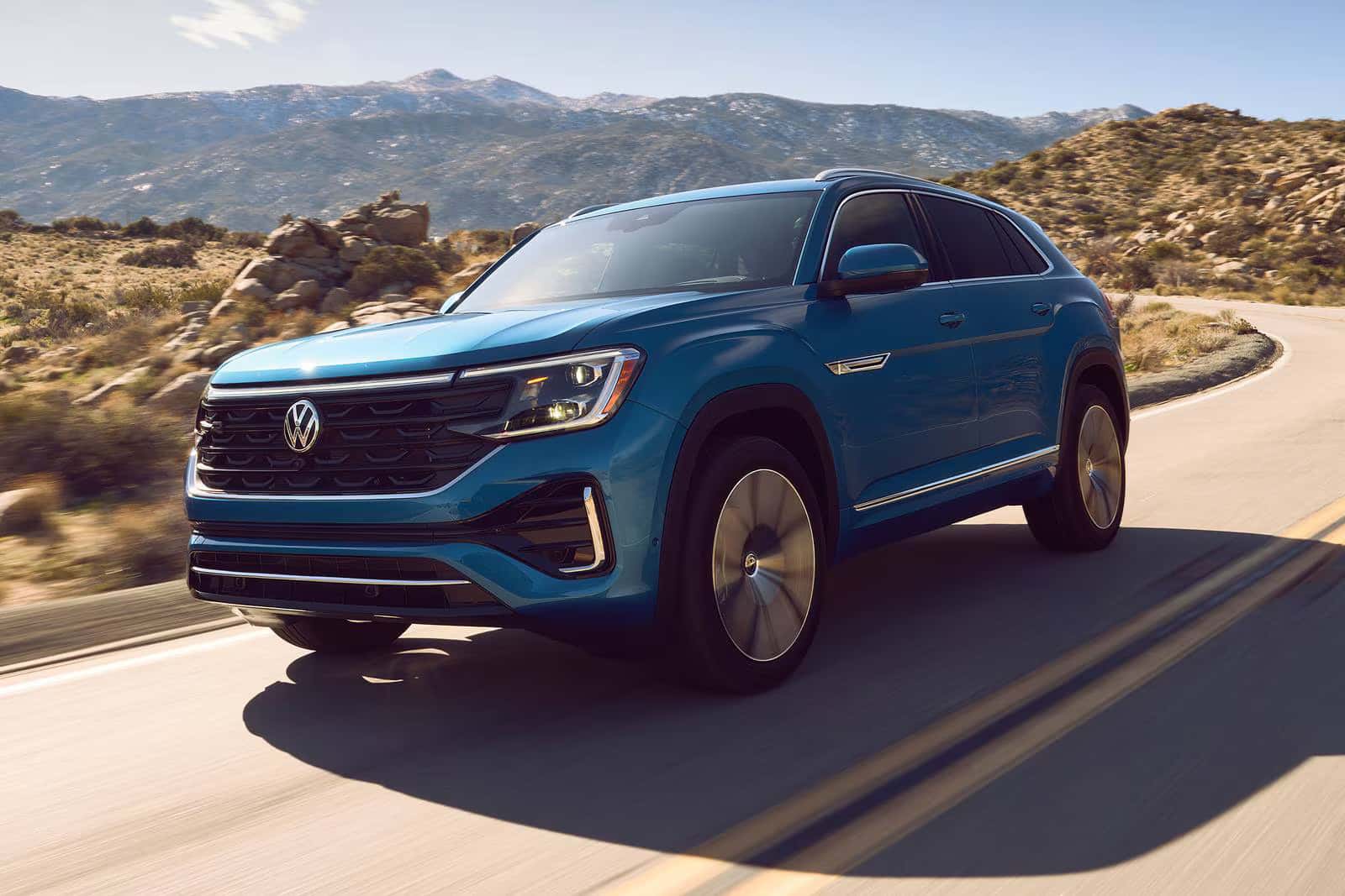 2026 Volkswagen Atlas Cross Sport driving on a road
