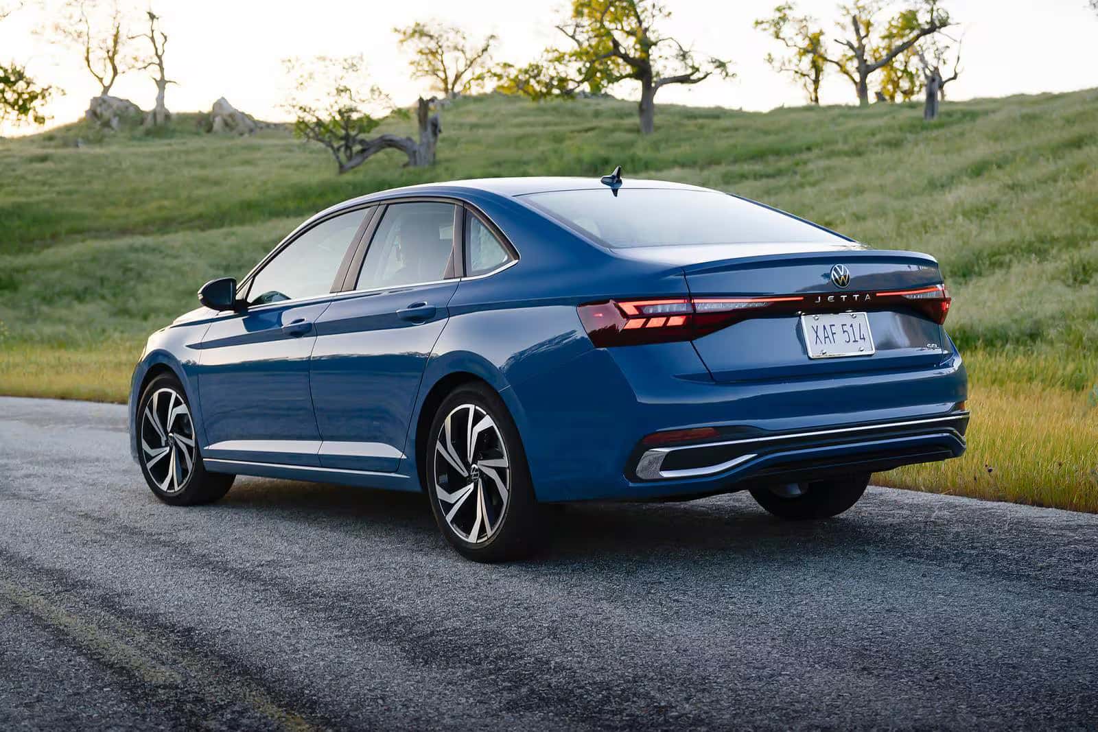 2026 Volkswagen Jetta driving next to a field
