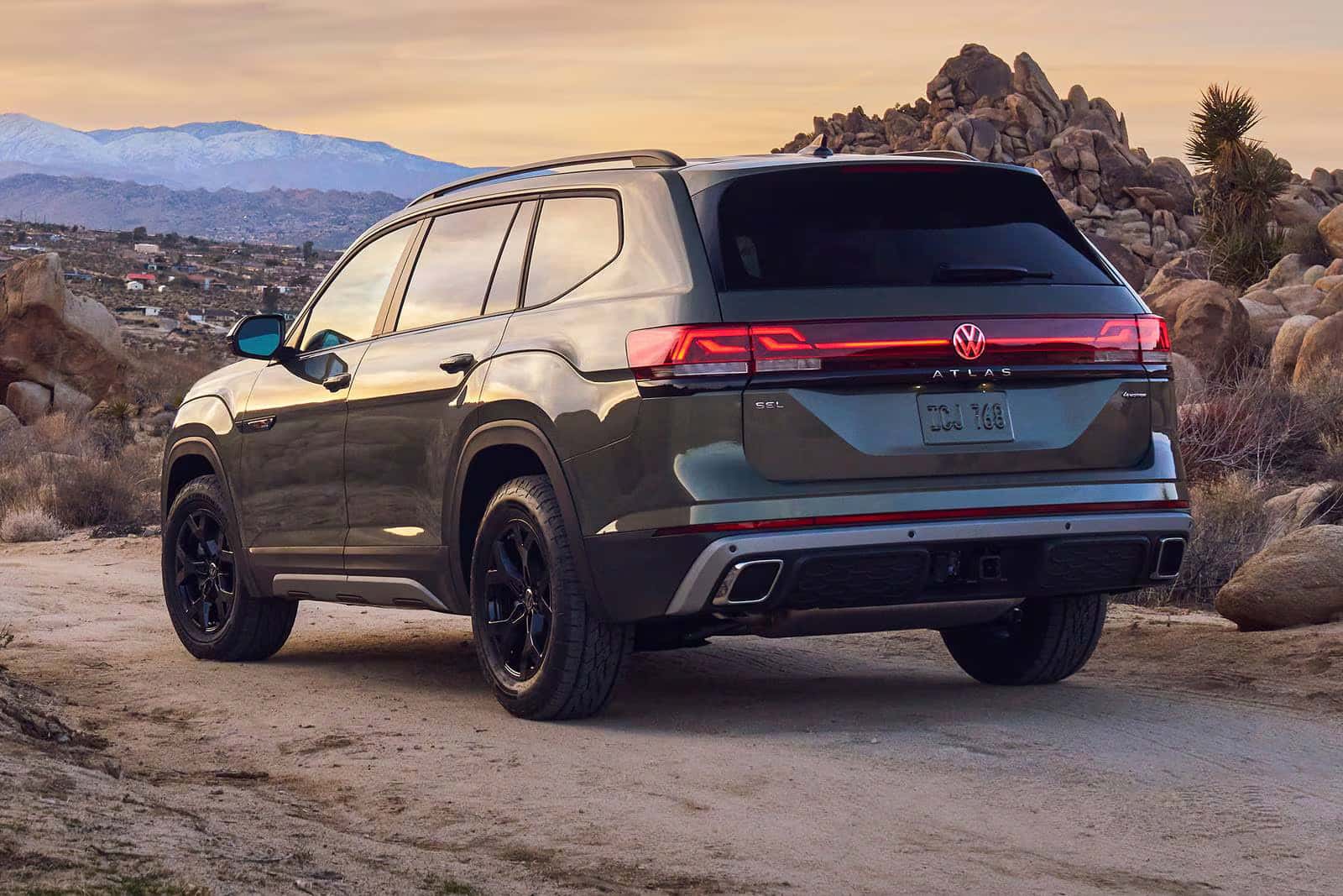 The new 2026 Volkswagen Atlas driving through the mountains