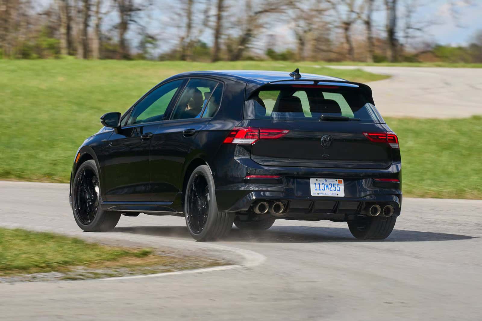 a 2026 volkswagen golf r driving on a track