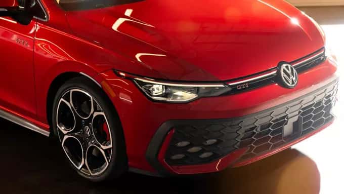 a view of the front end of the 2026 volkswagen golf gti parked in a garage