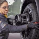 Service Technician Working on Tire
