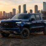 2026 Chevrolet Silverado 1500 in Midnight Blue Metallic at job site with Chicago city skyline at sunrise — Webb Chevy Oak Lawn, Oak Lawn, IL