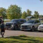 2026 Chevy family SUV lineup — Trax, Trailblazer, Equinox, and Traverse — on an Oak Lawn, Illinois street at Webb Chevy Oak Lawn