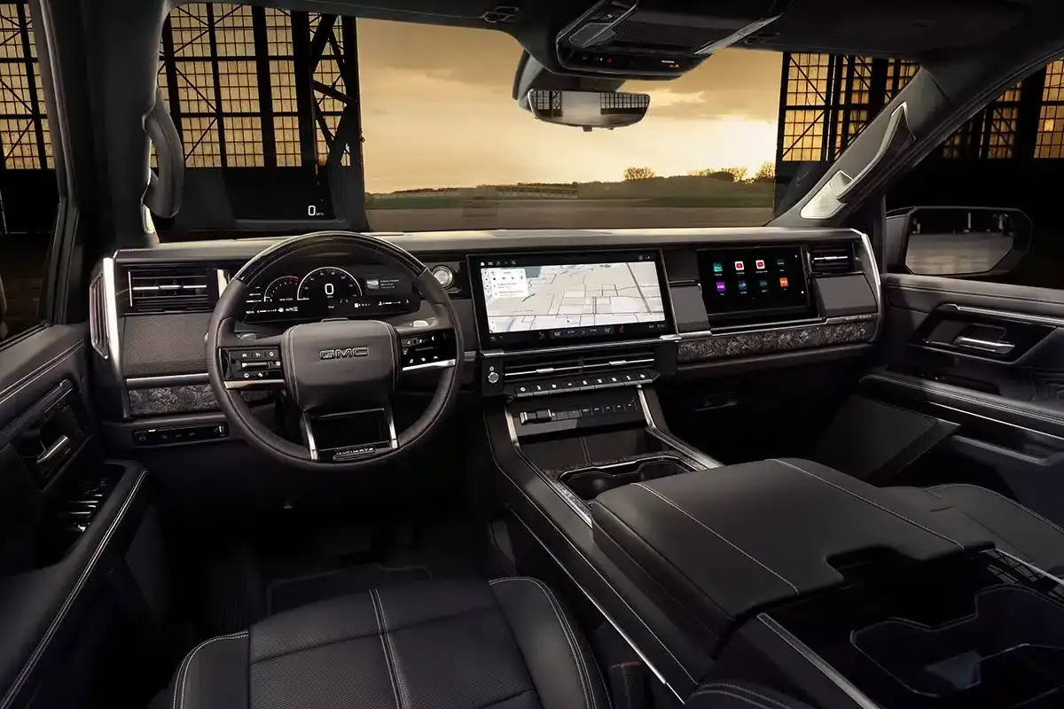 2027 GMC Sierra 1500 Denali Ultimate interior with over 60 inches of digital displays