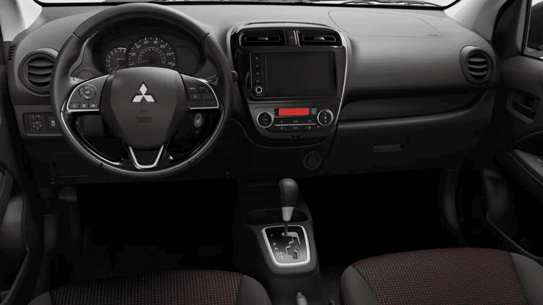 2024 Mitsubishi Mirage dashboard cockpit with touchscreen display, steering wheel controls, and automatic transmission