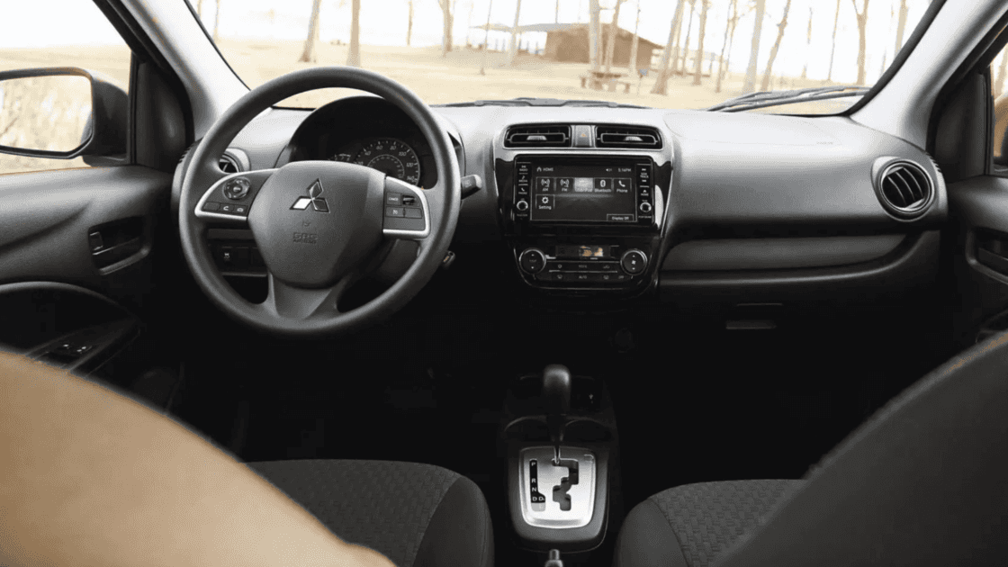 2024 Mitsubishi Mirage G4 interior, showing the dashboard and a view of the steering wheel and media controls.
