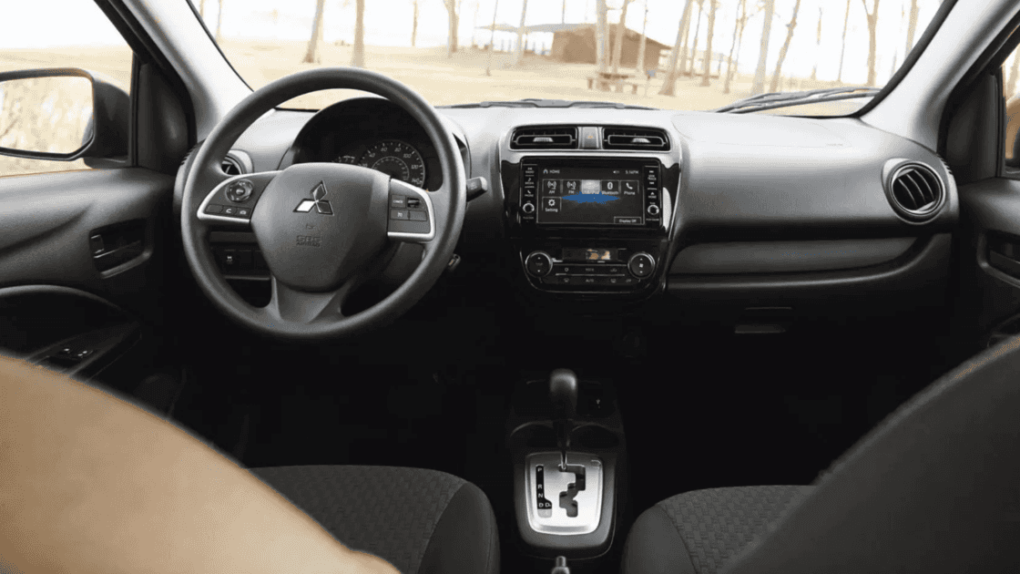 2024 Mitsubishi Mirage G4 interior seating showing front bucket seats, rear bench, and compact sedan cabin
