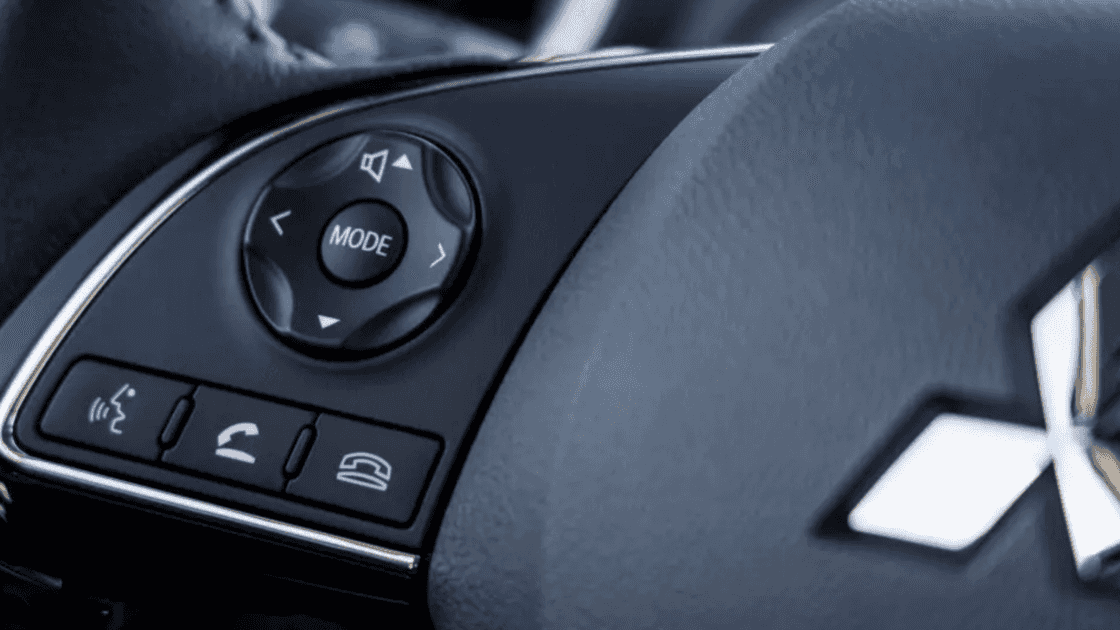 2024 Mitsubishi Mirage G4 dashboard interior with touchscreen infotainment, steering wheel controls, and automatic transmission