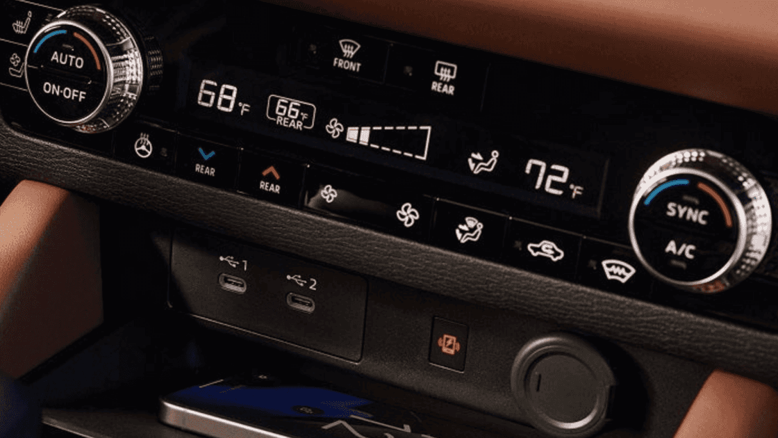2024 Mitsubishi Outlander dashboard cockpit with touchscreen display, steering wheel controls, and automatic transmission