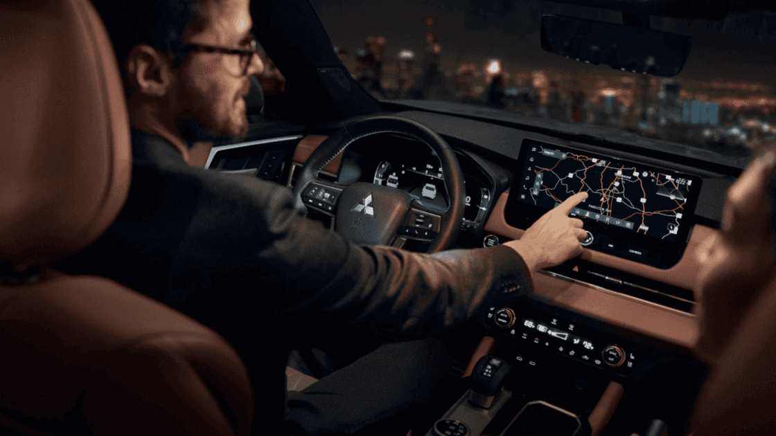 2025 Mitsubishi Outlander interior navigation system with large touchscreen display, digital map, and premium dashboard layout